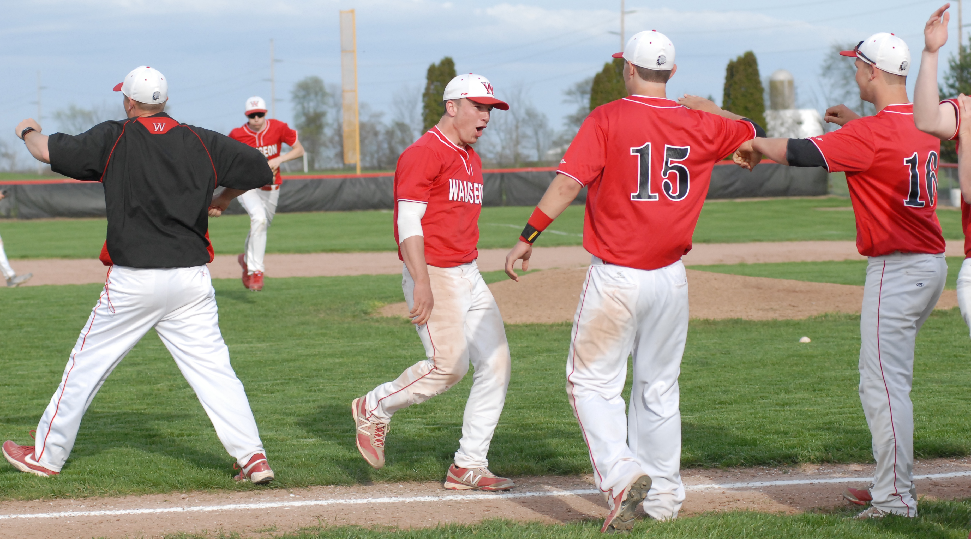Ty Suntken and Wauseon celebrating victory after ending the game with a 6-3 double play